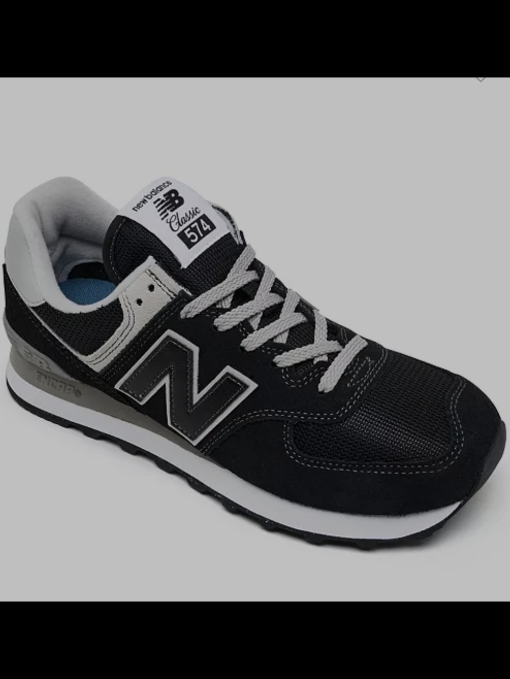 New Balance 574 Classic Sneaker in Black and Gray 6.5